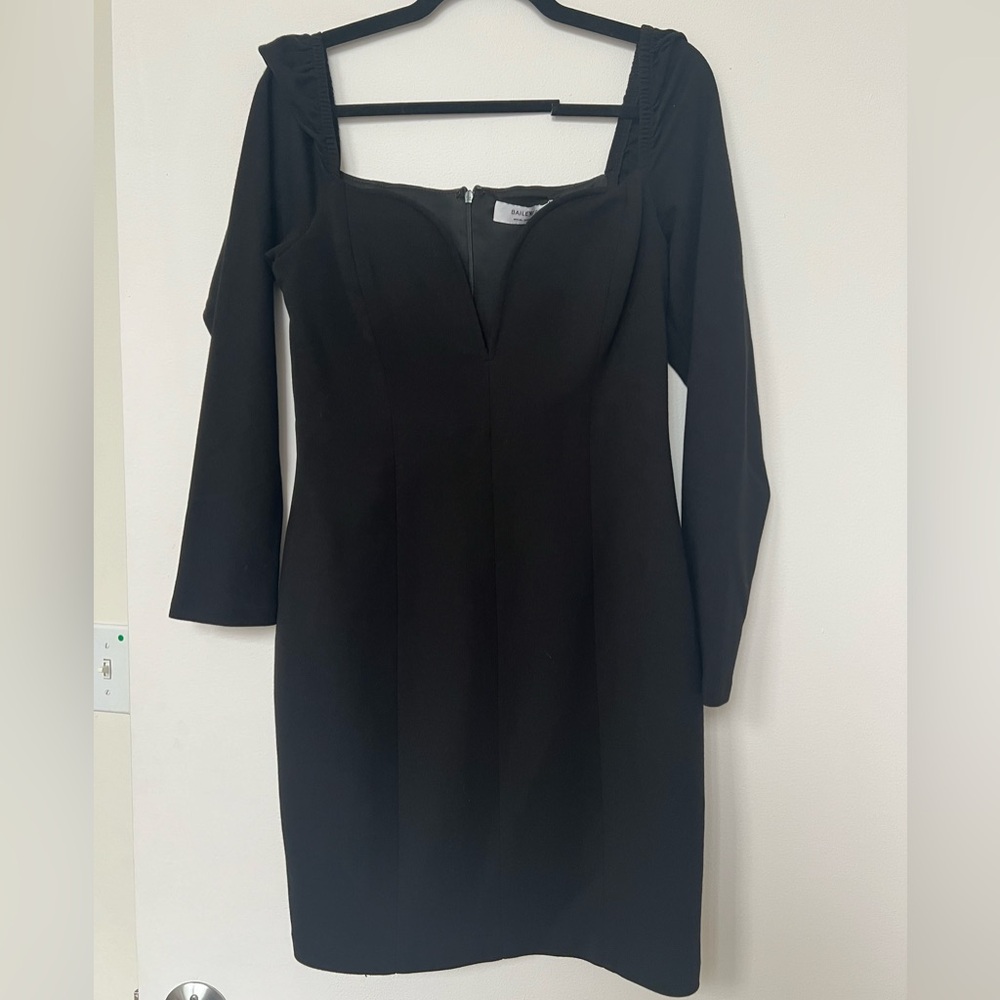 Black cocktail dress with heart shaped neckline